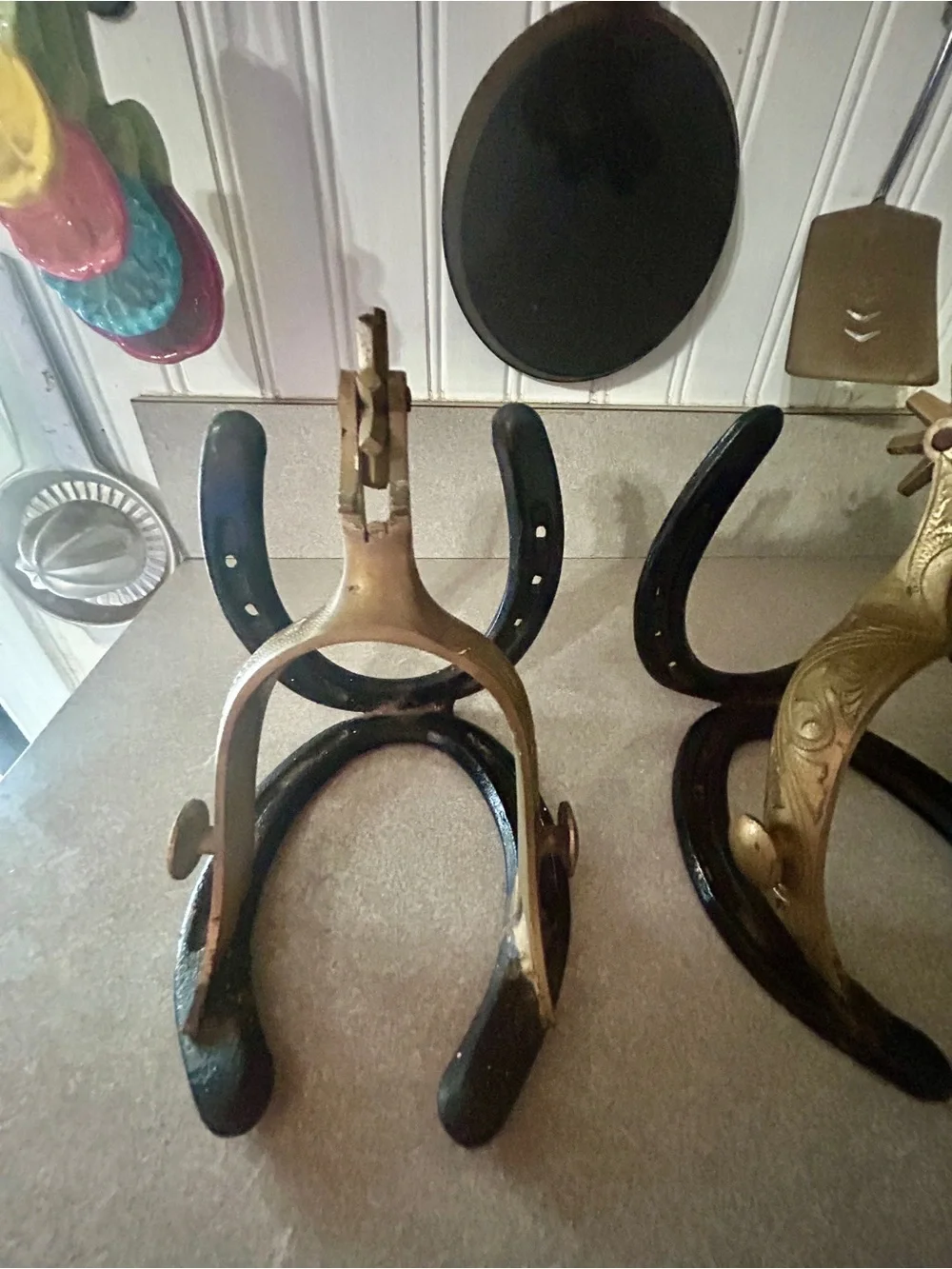 Cast Iron Horseshoe and Brass Spur Decorative Bookends - Black and Gold